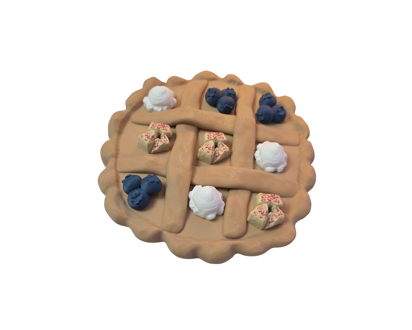 Kruisje Nulletje bordspel in de vorm van een appeltaart, met bosbessen, slagroom en appelstukjes speelstukken