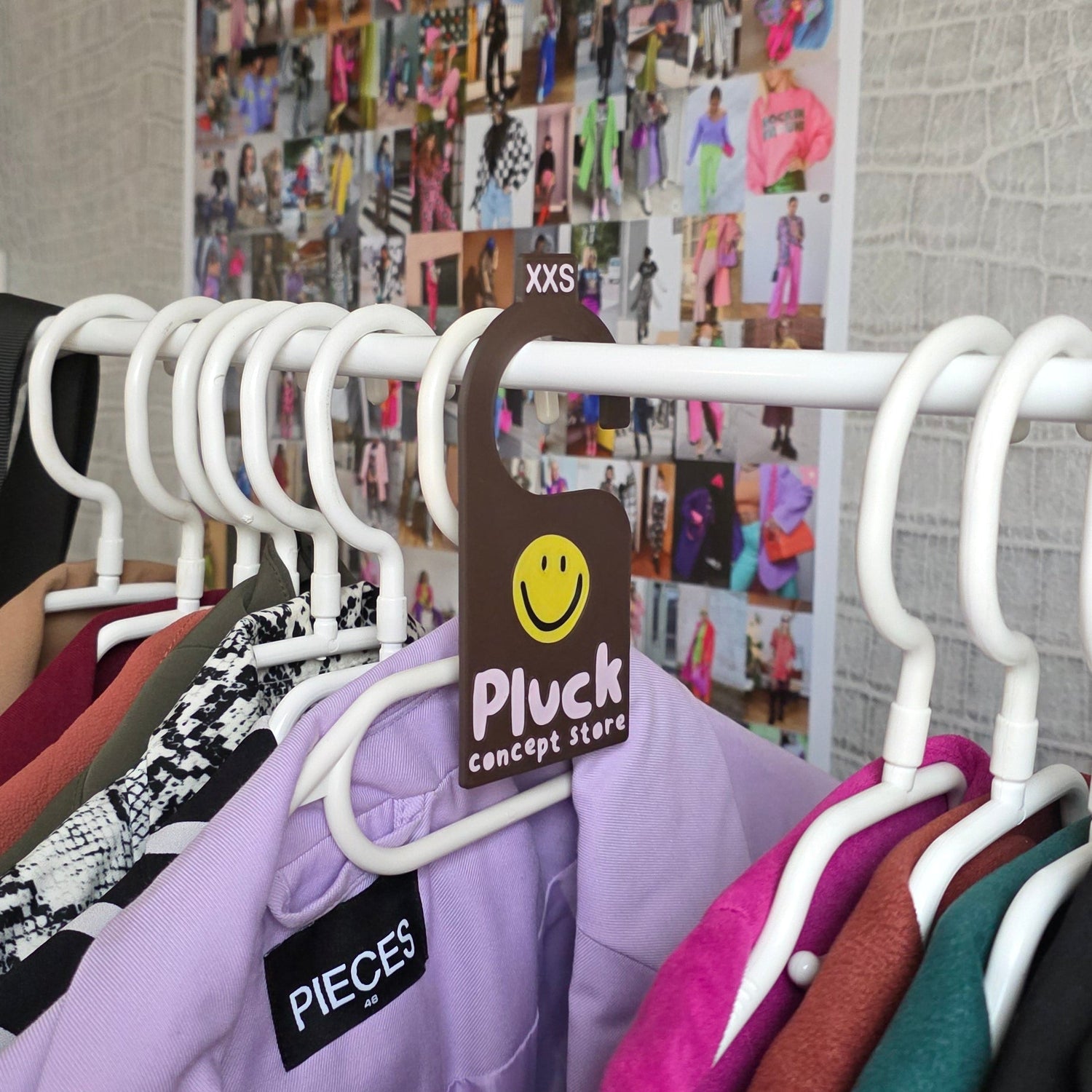 Maatverdeler kledingrek pluck conceptstore kledinwinkel